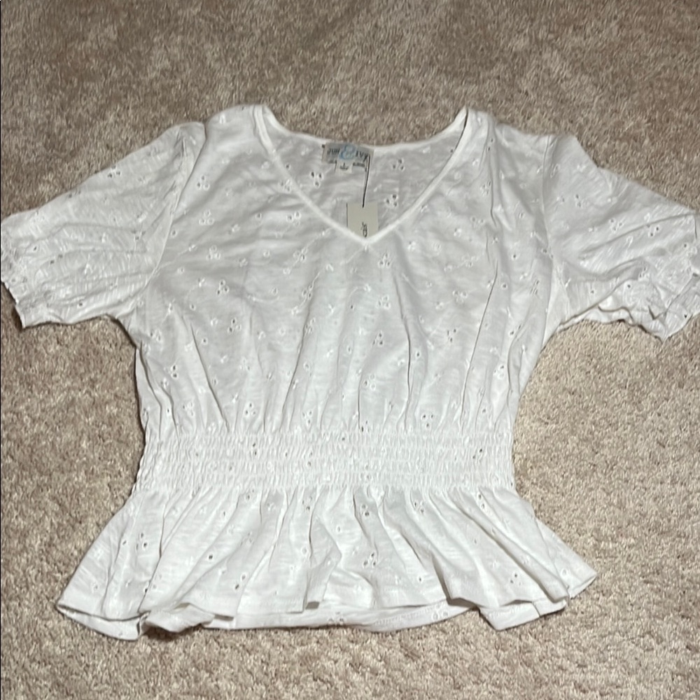 Francesca’s White Eyelet Peplum Top
